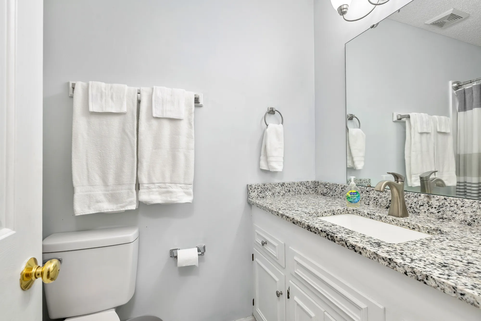 Cumberland East — full bathroom with granite vanity
