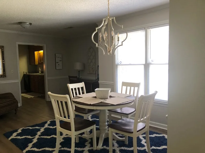 Cumberland West — dining area with seating for four