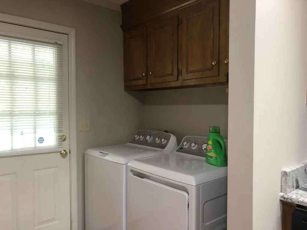 Cumberland West — laundry area with washer and dryer