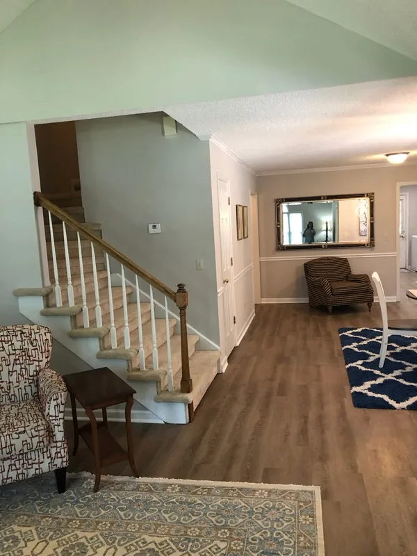 Cumberland West — entry foyer with staircase