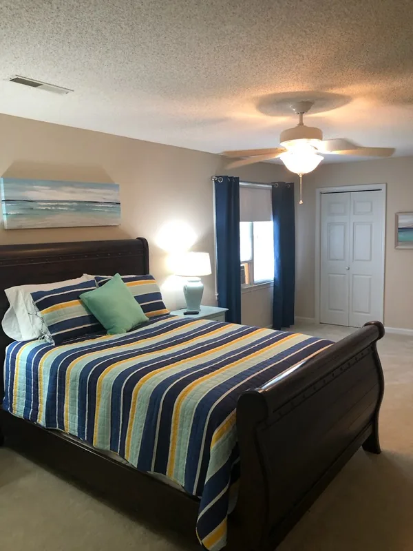Cumberland West — primary bedroom with sleigh bed