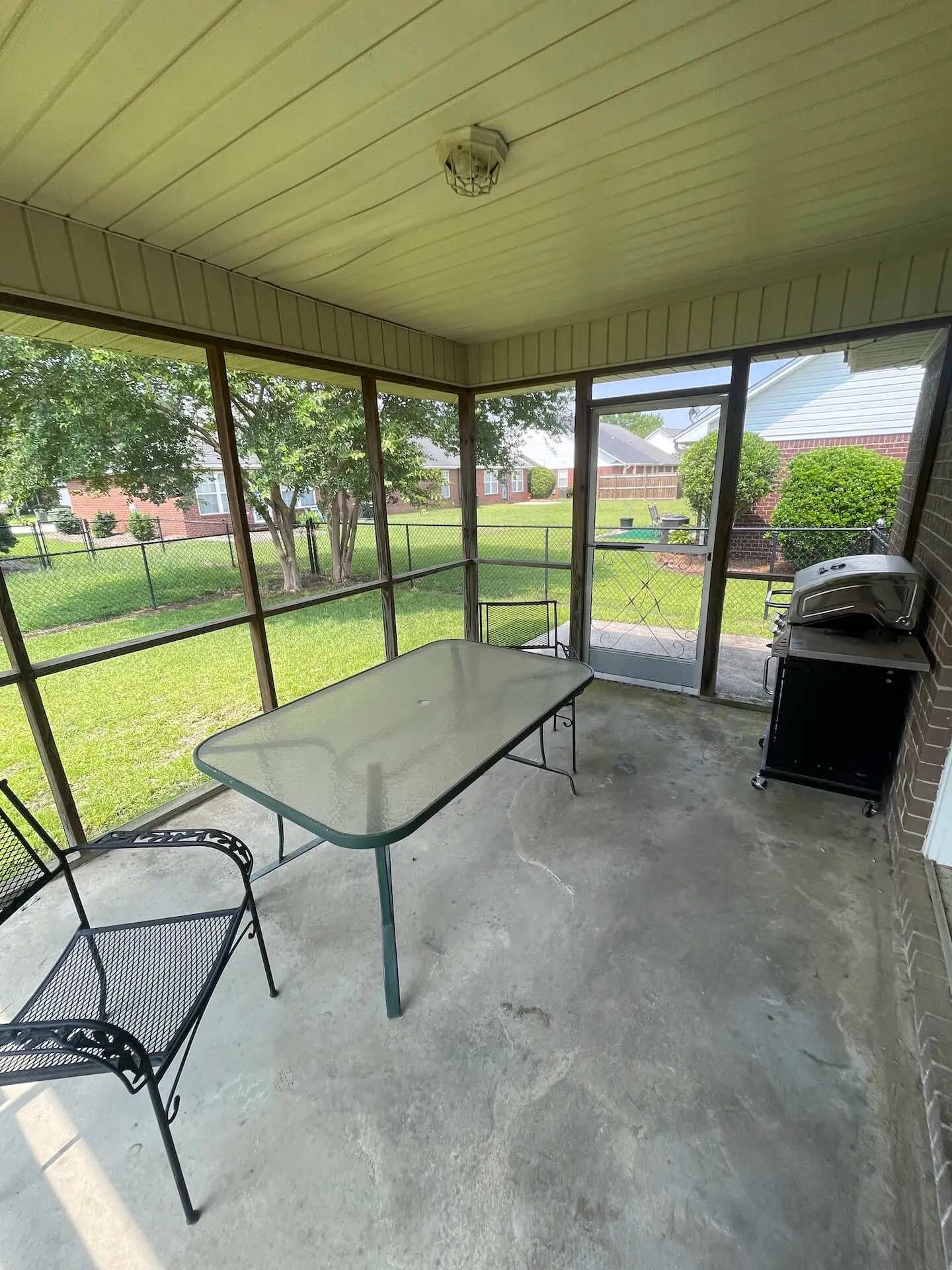 Horizon — screened back porch with backyard view