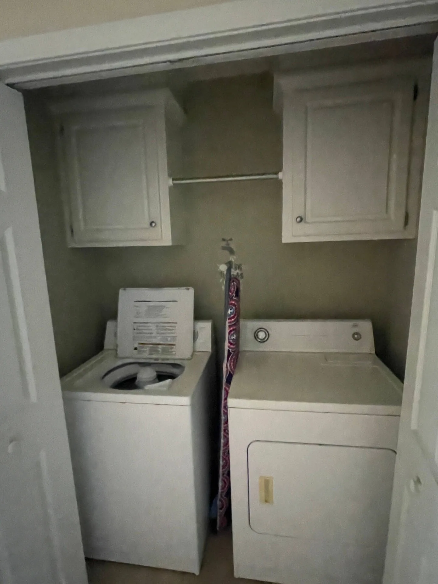 Landmark — laundry area with washer and dryer