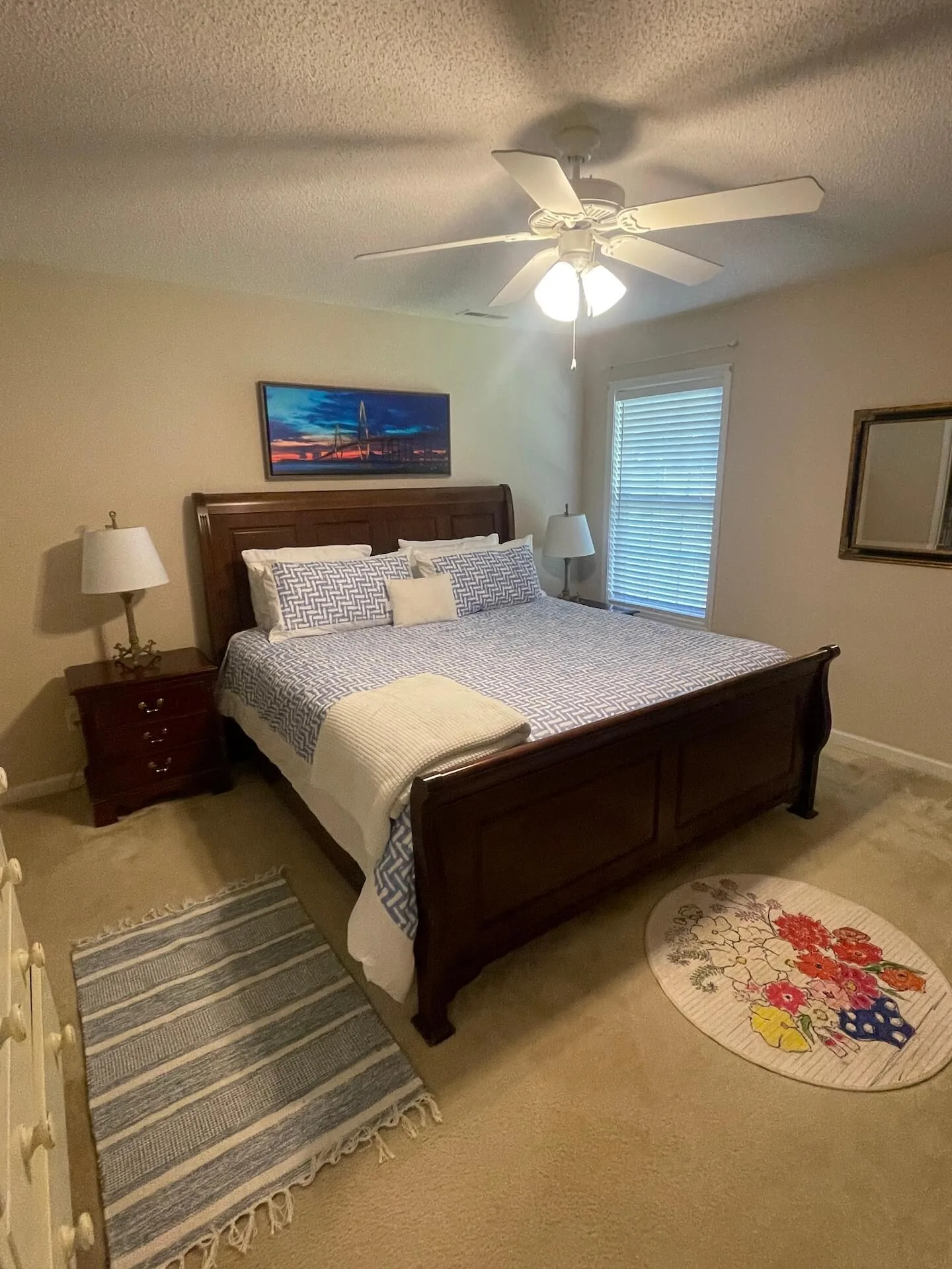 Landmark — primary bedroom with sleigh bed