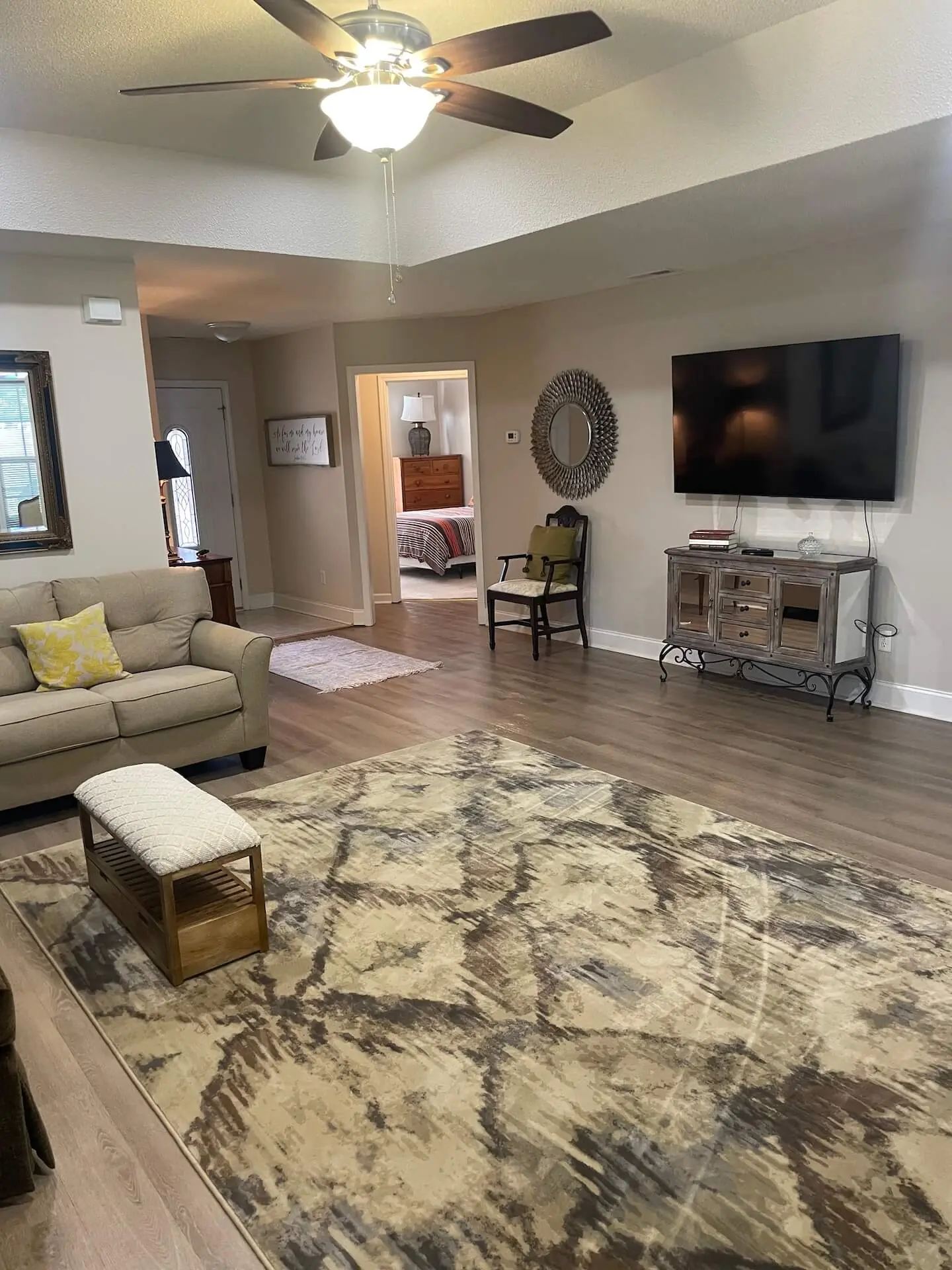 Landmark — family living room with sofa and Smart TV