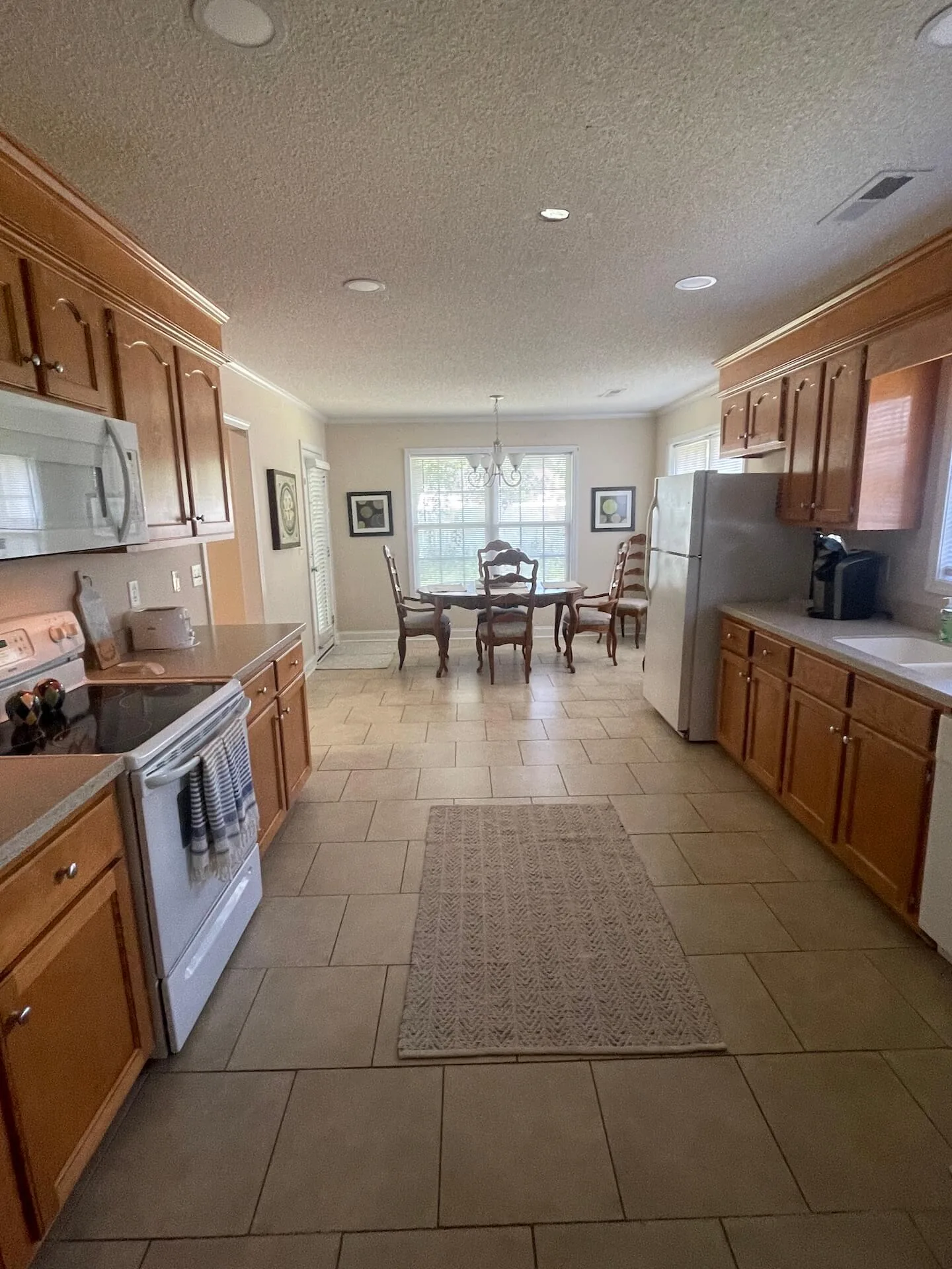 Landmark — kitchen open to the breakfast dining area